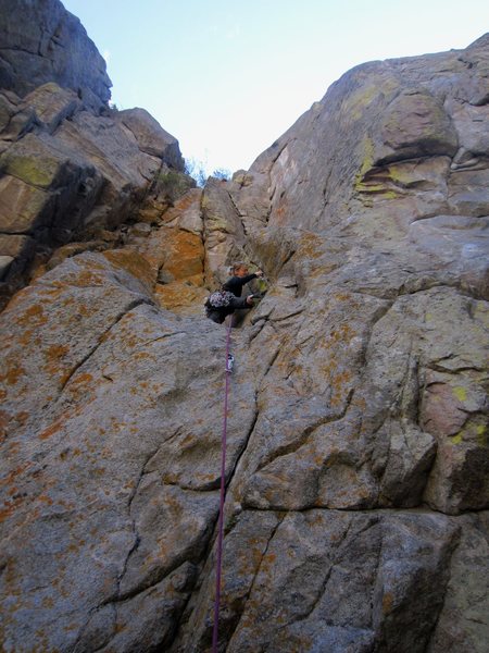 Kat A. gets started on the trad portion of 'Saved By the Bell' (11a) on Bell Buttress in Sept. 2012.
