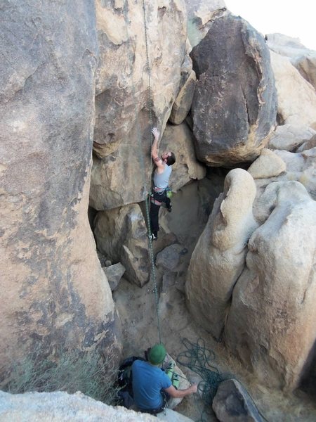 working the bottom of this sport route at sunset cliffs, toping roping to figure out moves on face.
