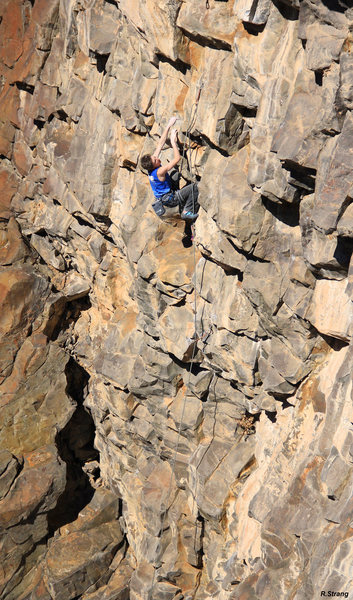 Ben Hanna on the lower slab<br>
Survival of the Fittest (5.13a)