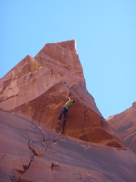 Climbing through the roof.