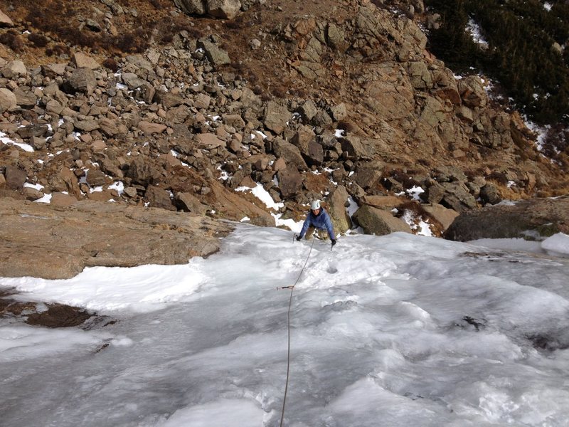 Nov. 3, 2012. Meagan Buck topping out the steep part of Columbine Falls. WI2 to the top. About 95ft to the top.