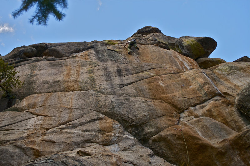 John Hinrichsen pulling through the second technical crux towards the Red Wood anchors. Photo: Elisa Phillips.