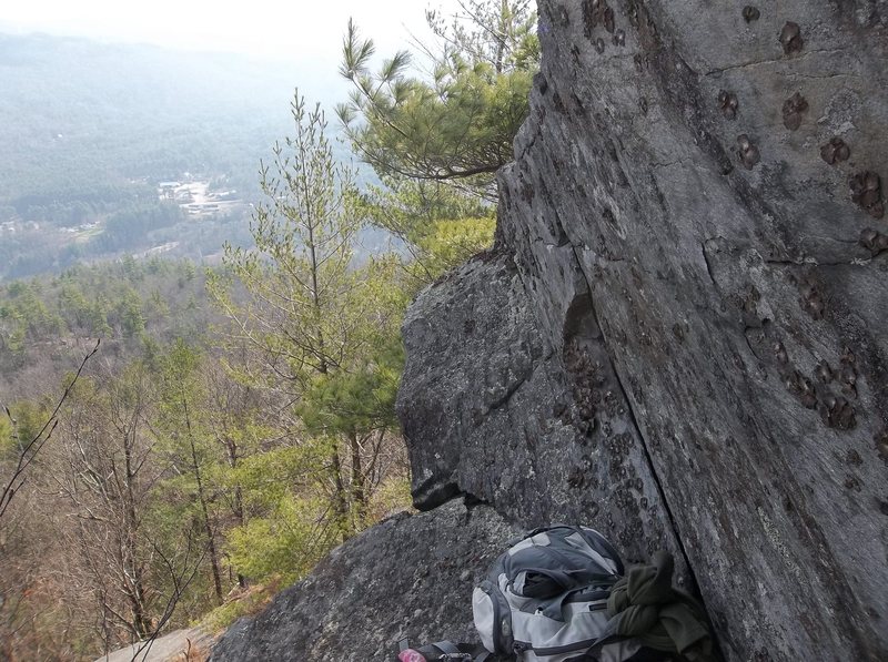 Sloping chill out ledge above the crack below this ledge unseen.