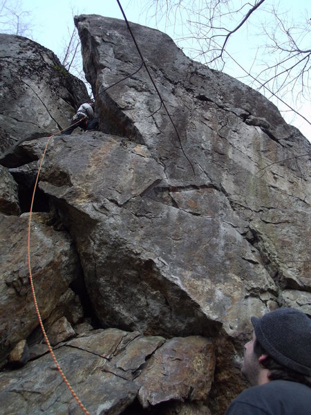 Jon getting to the first bolt and thats me on belay