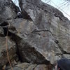Jon getting to the first bolt and thats me on belay