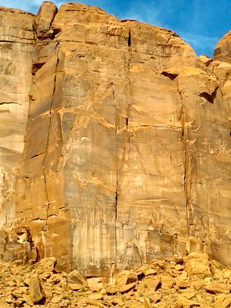Not the best photo but it shows the route which is the crack system in the center. To the left is a three pitch climb following a wide crack system.
