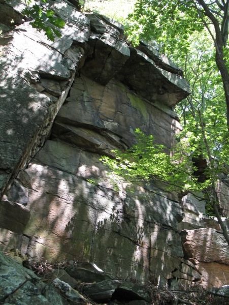 Rags to Riches is the right facing dihedral that finishes through the left end of the roof.