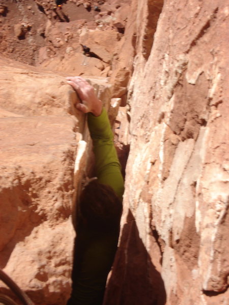 Very top of Pitch 3 (crux), Kor-Ingalls, Castleton Tower, Utah.