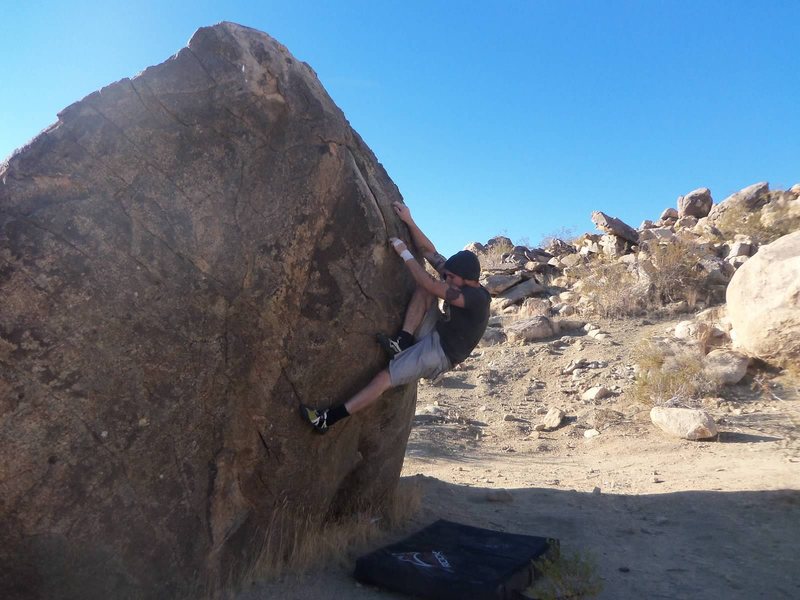 Climbing in Giant Pebble Boulder, High Desert