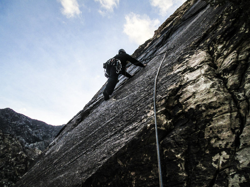 Jonny pondering the crux move. Photo by Gigi. 12/3/12