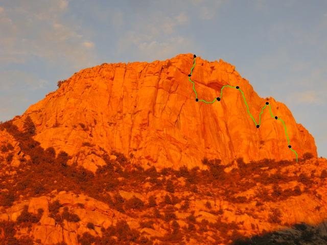 This Photo gives a general idea of the entire route with black dots showing belay spots and indicating pitch segments