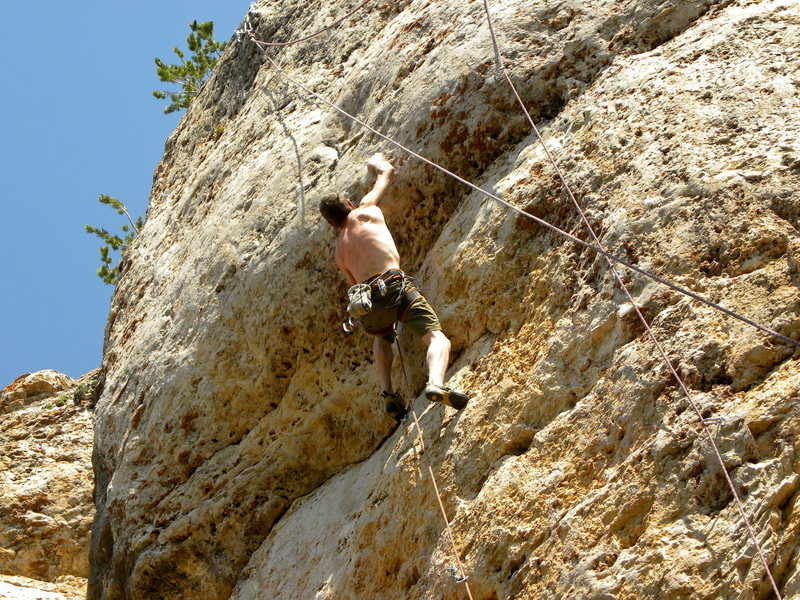 Approaching the crux move on Daddy Fat Sacks 5.12b/c.