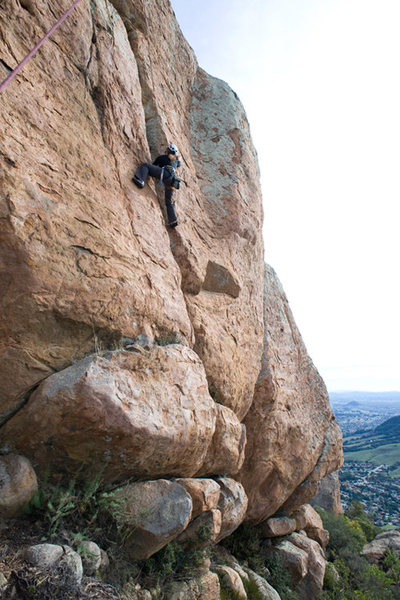 Marisa Fienup climbs Flakes to Fresno (5.8) at Bishop's Peak.