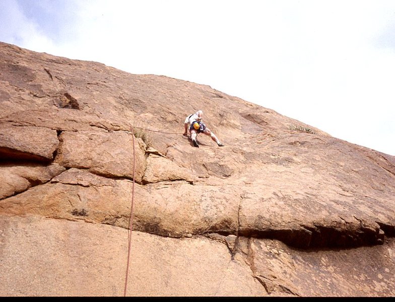 Paul Ross belayed by Claude Davies 1995. FA on a granite slab area located just south of the Hotel Les Amandiers.Tafroute. Photo Claude Davies
