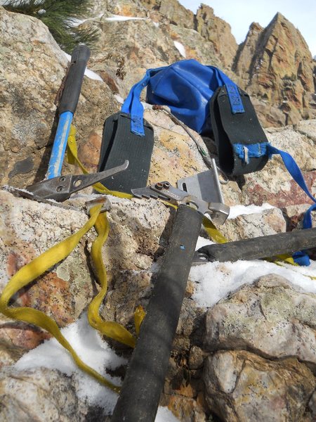 Forrest Leg Loops draped over crampon bag, Mjolnir, Lifetime Axe (black rubber handle added by owner), Titon, Copperhead.
