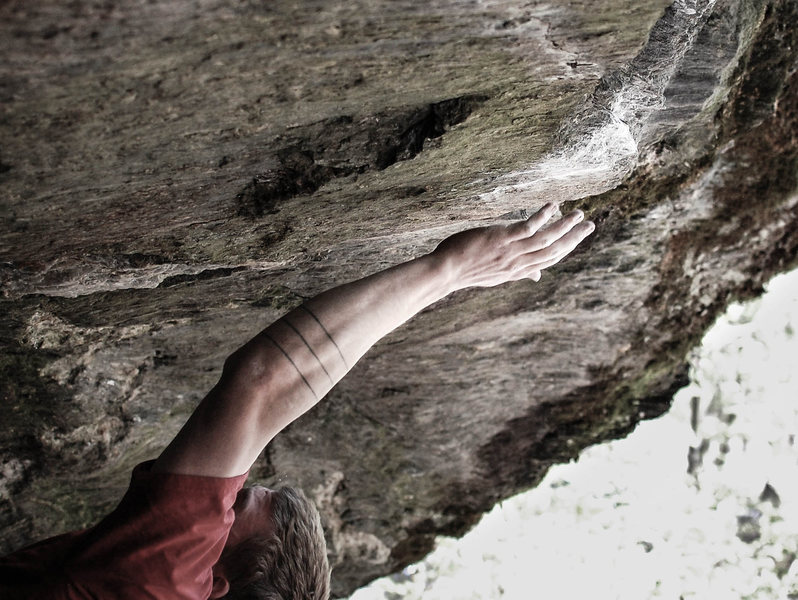 Matt making the crux lunge.