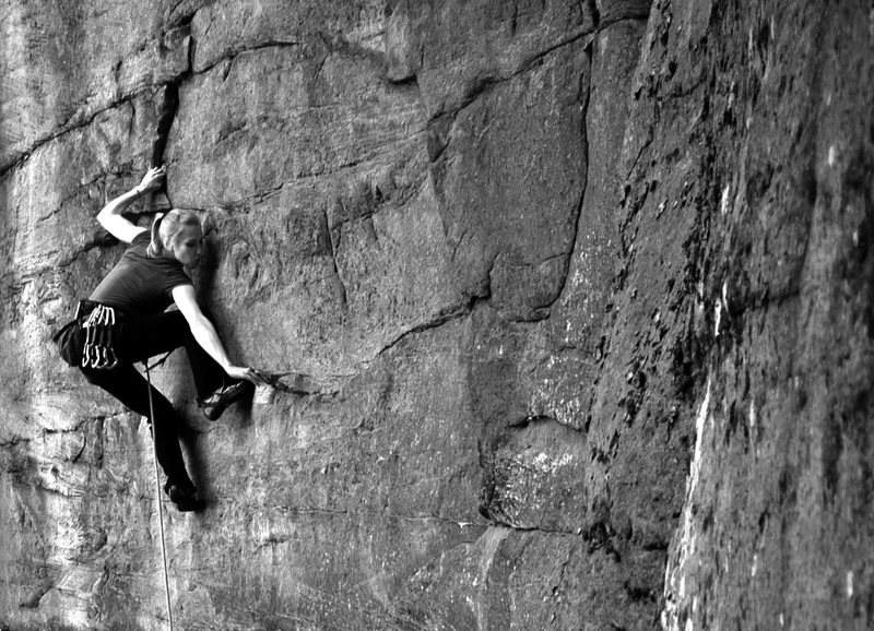 Lindsay powers through the Pockets of Resistance (5.12a) at Kaymoor in the New River Gorge, Fayetteville, WV. April 2011. http://danallardphoto.com