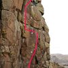 This is the route I take when I climb this. Yes, the holds are big, but the feet completely disappear a couple times.