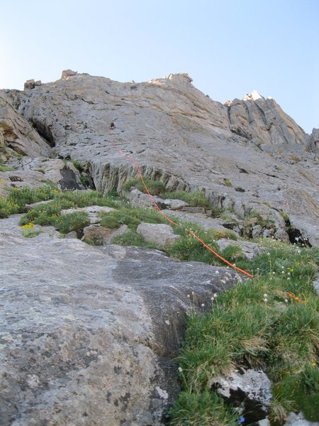 Low on the route with a little vegetation, and some nice clean slabs.
