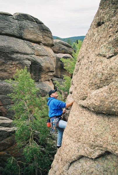 Ashby Robertson on the first ascent of some 5.8 crack/corner near Buena Vista, Colorado<br>
Sometime around 2002