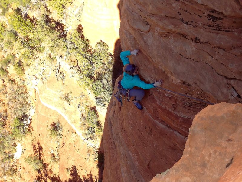 The slabby traverse near the top of P2.