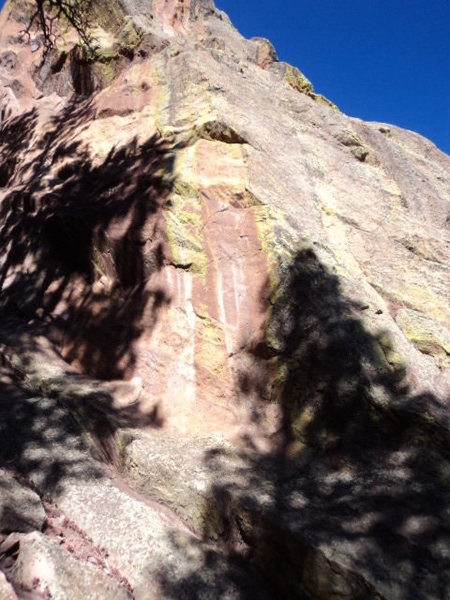 West Face, 12, and West Face Right, 12. Two bolt & gear routes that are lightly protected.