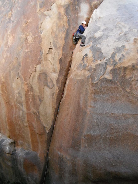 Rob Beno above the crux on Hand Grenade 5.10a