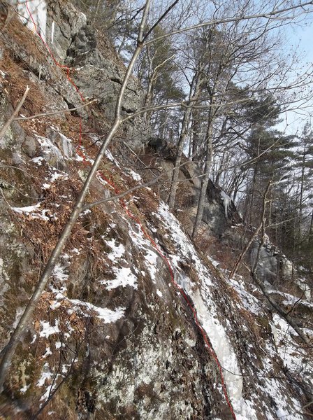Belay could be at the block crack before the ice curtain. Camera angle is off, making it appear a little steeper than correct.