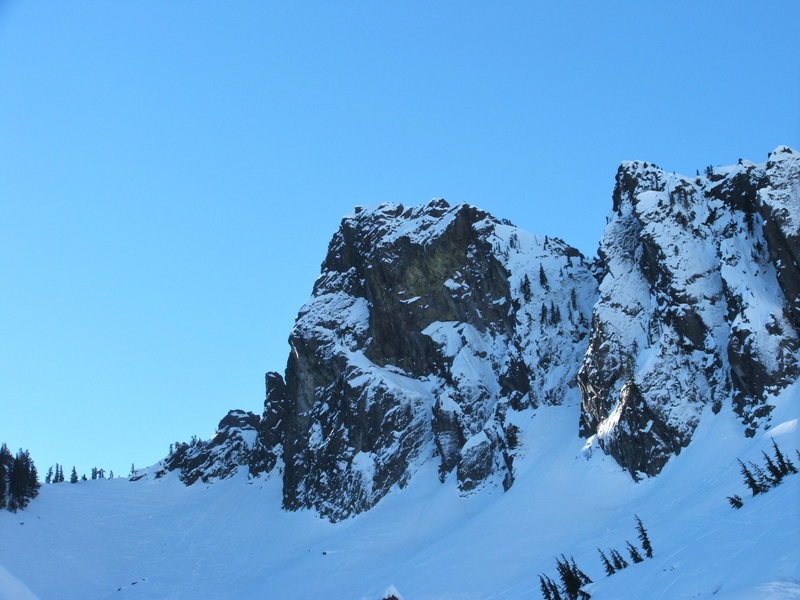 Early Morning view of The Tooth in January. South face route goes up left side of silhouette more or less.