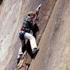 Stonemaster Dave Wonderly getting into the crux on the first pitch of Hyperion Arch, 1983.<br>
<br>
<br>
photo by bob gaines 