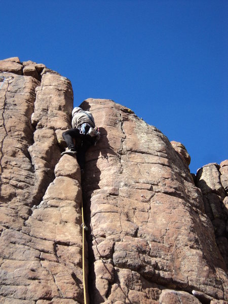 George ascends the crack. He is just below the crux.