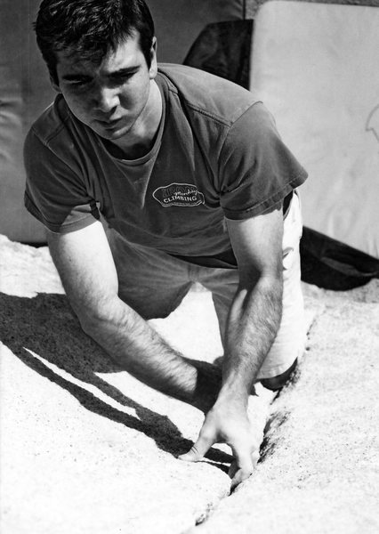 Working up Pinhead Crack in The Outback of Joshua Tree, CA. April 2006.