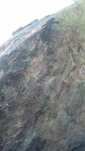 Not the best pic, but you get an idea of the crimps up to the arete.