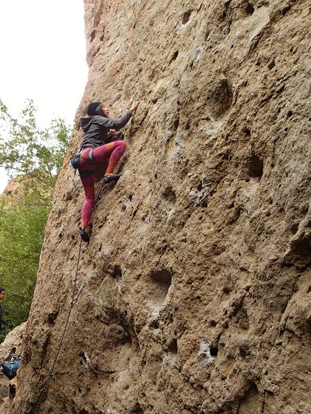 Jackie Trejo nearing the over hung portion of the climb.