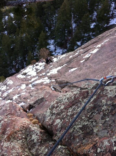 A snowy day on the First Flatiron. Off route on Baker's Way (5.3)