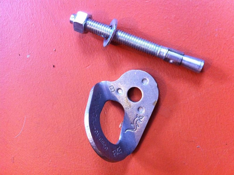Hanger and bolt. The stamp on the hanger reads "FIXE 038D-10 30-KN INOX". There are no stamp on the bolts.
