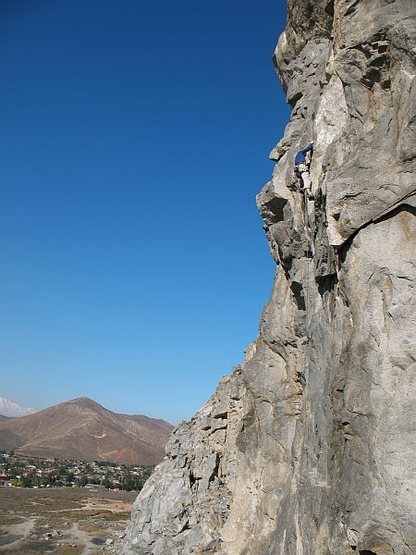 High above it all on Fueled by Slander (5.11b), Riverside Quarry