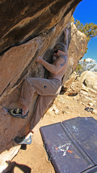 Making the crux reach<br>
Waiting For The Sun (V2)