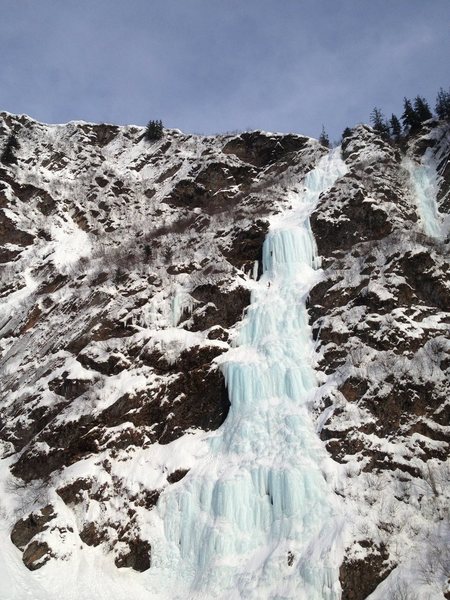 Climbers on the crux "Killer Pillar" of Bridalveil Falls