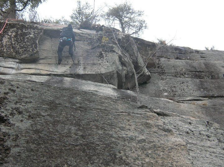 Joshua Corbett tackles the cracks of the upper headwall.