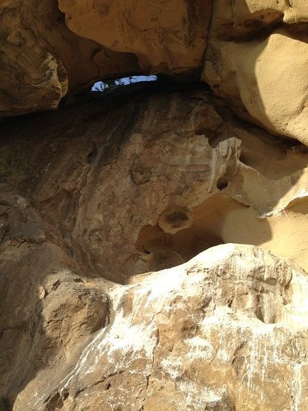 2nd pitch of the Cave route in all its glory. Heavy on the guano with a liberal helping of sand on most holds. The squeeze is fun, but the climb not worth it.