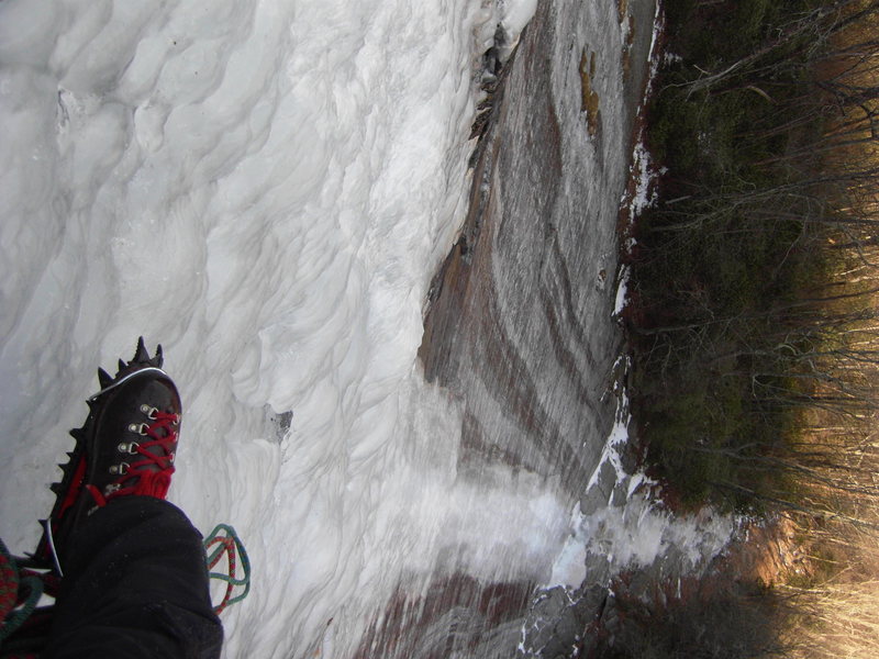 Looking down past my old school Habeler Superlight boot and Lowe footfang, from the P1 belay, Starshine, March 2013