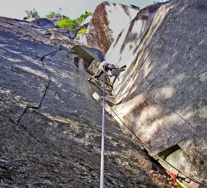 Top of P1 on Wilman's Walkabout. This section is about 10d.<br>
<br>
The thin finger crack on the left wall is Sedan Delivery, 11c.