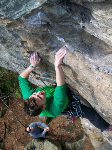 Kons working some of the open-handed holds.