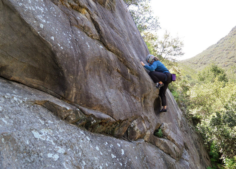 Nicole pulls the crux of From the Ashes, at the Foot in Ojai.