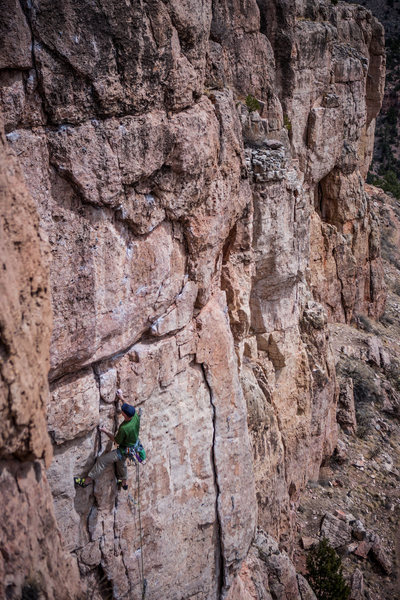 Mystery climber (Tom?) moving into the tough upper section.