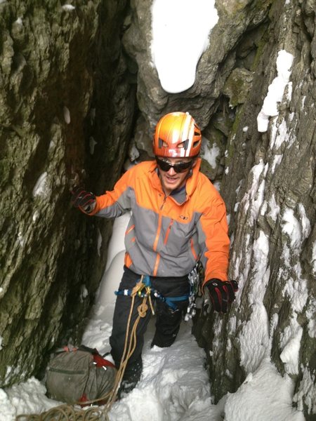 Dan in the belay cave on top of pitch one. Getting ready for the coin toss for what will be the rock crux lead.