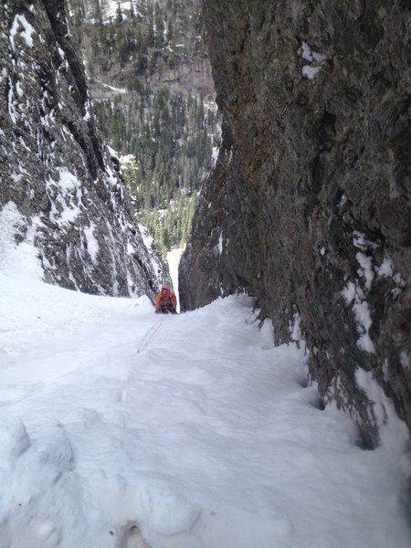 Dan finishing pitch 2.<br>
Belay is simply a hole dug in snow against rock wall.