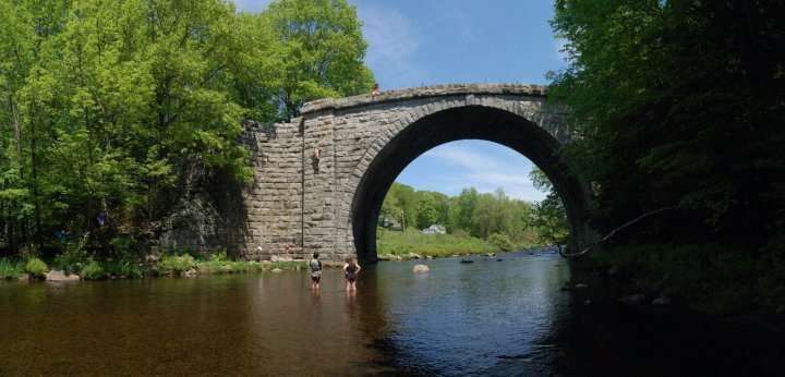 Stone Arch Bridge Keene, NH. This thing was built way back in the day without motar. It's quite the structure and great for climbing. Just minutes from campus/mainstreet. Watch out for poison ivy if you set up on sections other than in pic.