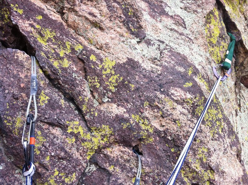 Belay perched on top of the boulder/flake at the end of Reggae. A thread and creative nut placements in solution pockets make it possible!
